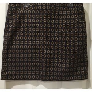 Loft skirt Size 12, navy with gold flowers. Slant pocket.